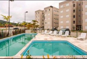 Apartamento em Guarujá com PISCINA Wi Fi GARAGEM